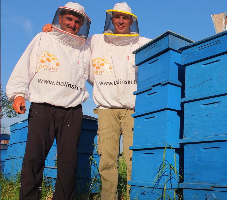 balinski beekeepers with beehives